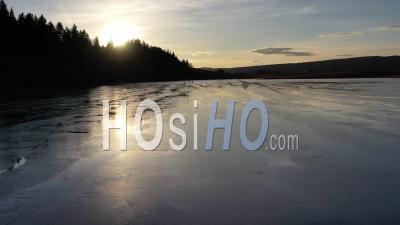Frozen Lake And Ice Skating - Video Drone Footage