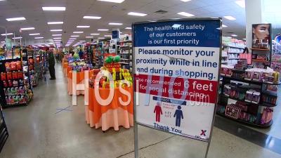 2020 - Shoppers Are Advised To Maintain Social Distancing And An X Is Placed On Floor To Maintain Distance During The Coronavirus Covid-19 Pandemic Outbreak.