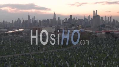 Aerial Of Vast Cemetery In New York City Suggests Losses From Coronavirus Covid-19 Pandemic Epidemic Outbreak Deaths. - Video Drone Footage