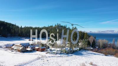 2020- Winter Snow Aerial Over Glenbrook, Nevada Community, Ranch Houses On The Shores Of Lake Tahoe Nevada. - Video Drone Footage