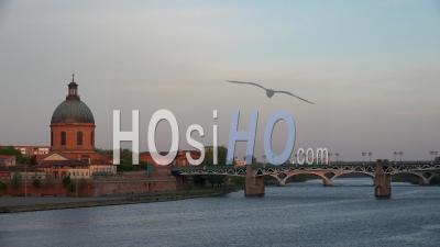 Toulouse City, The Edges Of The Garonne River, Saint-Pierre Bridge And Grave Hospital Dome