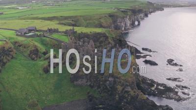 Ruins Of Dunluce Castle On The Antrim Coast, Northern Ireland. Aerial Drone View