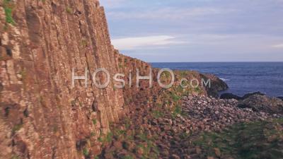 Giants Causeway At Sunrise On Antrim Coast Of Northern Ireland. Aerial Drone View