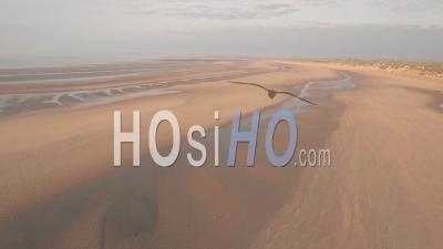 Camber Sands Beach At Sunset, East Sussex, England. Aerial Drone View