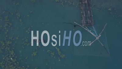 Traditional Chinese Fishing Nets And Fishing Boat At Fort Kochi, India. Top Down Aerial Drone View