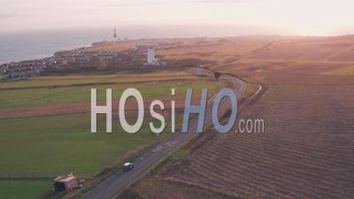 Cars Driving Towards Portland Bill Lighthouse, Dorset, England. Aerial Drone View