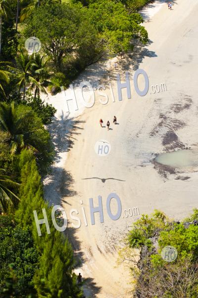 Tourists Walking Along Deserted East Railay (rai Leh) Beach, South Thailand, Southeast Asia