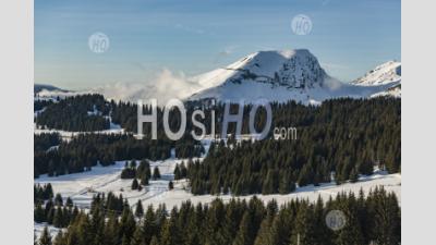 Dramatic Snowy Winter Mountain Landscape With Forests At The Ski Resort Of Morzine In The Alps Mountain Range Of France, Europe