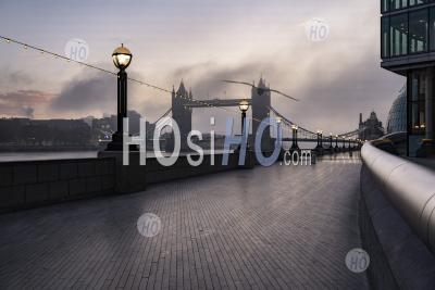 Tower Bridge In London With Beautiful Colourful Sunrise, Dramatic Clouds And Sky, Showing Iconic Famous City Skyline And Landmark On Day One Of Coronavirus Covid-19 Lockdown In England, Uk