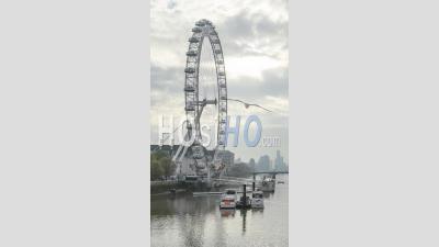 Vertical Timelapse Video Of The London Eye And River Thames At Sunset, London Skyline Time Lapse With Westminster Bridge Behind, Shot In The Covid-19 Coronavirus Pandemic Lockdown In England, Europe