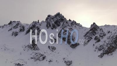 Aerial Footage Of Saulire Summit Near Courchevel Ski Resort And Deserted Ski Slopes While Covid-19 Lockdown, Filmed By Drone, Savoie, France