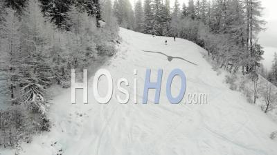 Skiers Climbing A Slope In Closed Ski Resort During Covid 19 Pandemic - Video Drone Footage