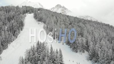 Skiers Hiking In Closed Ski Resort - Video Drone Footage