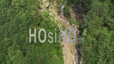 Waterfall In The Swiss Alps Aerial View - Video Drone Footage