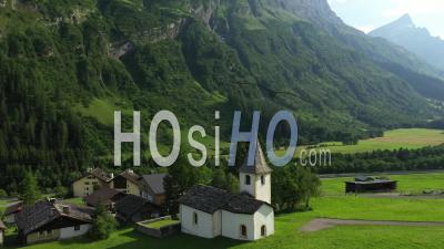 Small Church In The Swiss Alps, Medels Im Rheinwald, Switzerland - Video Drone Footage