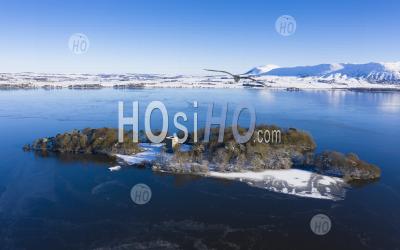  Aerial View Of A Snow Covered Loch Leven Castle Situated On Small Island On Loch Leven, Kinross-Shire, Scotland, Uk - Aerial Photography