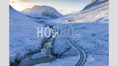 Aerial View Of Snow Covered Glen Etive During Winter, Highland, Scotland, Uk - Aerial Photography