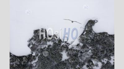Aerial View Of Frozen Loch Vaa With Small Boathouse, Aviemore, Scotland, Uk - Aerial Photography
