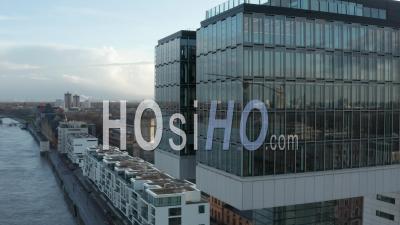 Aerial View Of  Cologne Futuristic Kranhaus, Crane House Apartments, Office Buildings In Beautiful Sunlight With Reflections 4k - Video Drone Footage