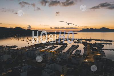 Aerial View Over Golden Sunset In Harbor Bay With Boats In Spain Hq - Aerial Photography