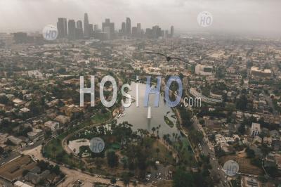 Echo Park In Los Angeles With View Of Downtown Skyline And Foggy Polluted Smog Air In Big Urban City Hq - Aerial Photography