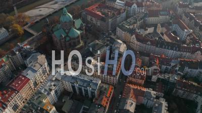 Tilt Down Aerial Shot Above Typical Germany City Neighbourhood In Munich Next To Beautiful Cathedral And Isa River, Residential Streets, Aerial Birds Eye Overhead Top Down View - Video Drone Footage