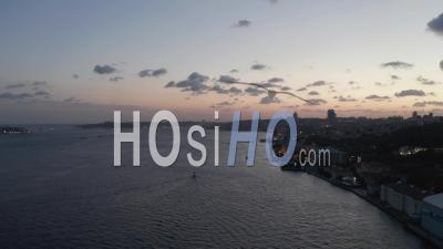 Wide View Over Bosphorus At Dusk With Orange Colored Sky, Aerial View - Video Drone Footage