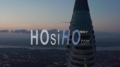 Circling Istanbul Skyscraper Skyline In The Distance Next To New Tv Tower From Epic Aerial Perspective At Dusk, Slide Right - Video Drone Footage