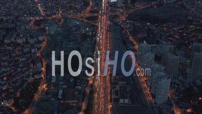 Long Highway Or Freeway At Night In Istanbul Financial District City Endless Intro The Distance With Traffic Jam And Red Lights, Aerial View - Video Drone Footage