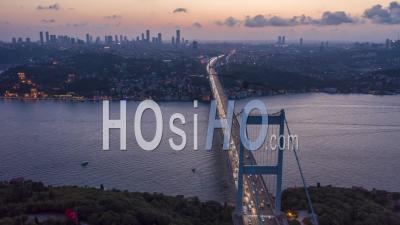 Istanbul Bosphorus Bridge At Sunset With Car Traffic Lights And City Skyline, Aerial Hyperlapse Motion Time Lapse Slide - Video Drone Footage