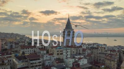 Galata Tower In Sunrise Sunlight, Aerial Hyperlapse Drone Time Lapse Circle Shot