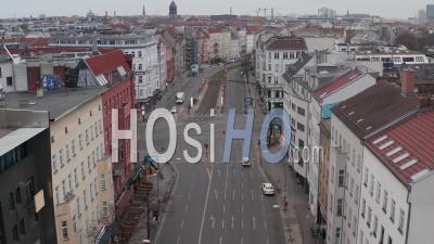 Aerial Slow Flight Over Empty Berlin Central Neighbourhood Rosenthaler Platz With Almost No People And No Cars During Coronavirus Covid 19 On Overcast Cloudy Day - Video Drone Footage