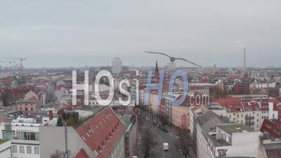 Aerial Slow Flight Through Empty Central Berlin Neighbourhood Street Torstrasse Over Rooftops During Coronavirus Covid 19 On Overcast Cloudy Day - Video Drone Footage