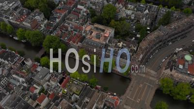 Birds Eye View Of Typical Amsterdam, Netherlands Neighbourhood With Canals And Bridges 4k - Video Drone Footage