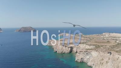 Wide Aerial Establishing Shot Of Greek Island Milos In Summer With Turquoise Blue Aegean Sea 4k - Video Drone Footage