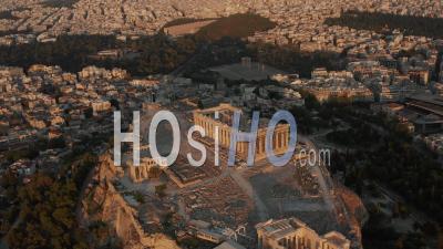 Aerial Perspective Of Acropolis Of Athens In Golden Hour Sunset Light 4k - Video Drone Footage