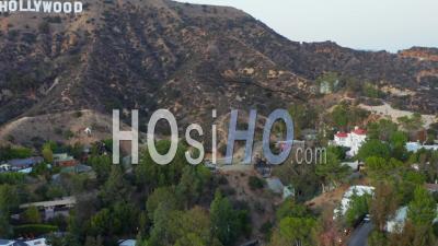 Looking Up To Hollywood Sign,Letters In Hollywood Hills At Sunset, Los Angeles, California 4k - Video Drone Footage