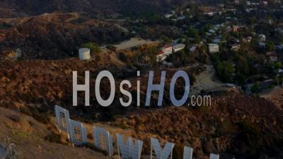 Beautiful Shot Over Hollywood Sign Letters Looking At Downtown La At Sunset, Los Angeles, California 4k - Video Drone Footage