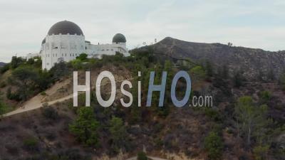 Griffith Observatory With Flight Over Hollywood Hills On Cloudy Overcast Day In Los Angeles, California 4k - Video Drone Footage