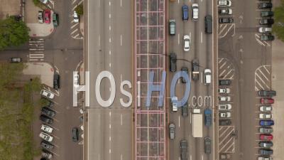 Top Down Overhead Aerial Birds Eye View Following Slow Moving Traffic Across Multi Lane Highway Towards Manhattan During Rush Hour 4k - Video Drone Footage