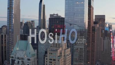 Close Up Of Essex House Manhattan Skyline At Wonderful Sunset With Flashing City Lights In New York City At Central Park In Beautiful 4k - Video Drone Footage