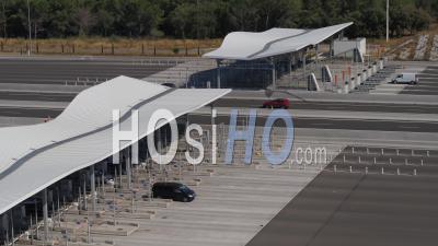 Toll Booth Baillargues-Montpellier And Black Van In The Morning With Moderate Traffic - Video Drone Footage