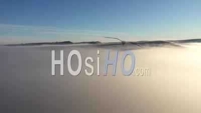 Aerial View Of Clouds In A Misty Morning - Video Drone Footage
