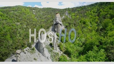 Geological Site Of The Demoiselles Capped Du Sauze (fairy Chimneys), Hautes-Alpes, France, Viewed From Drone