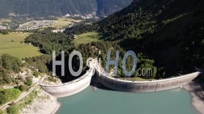 The Double Hydroelectric Dam And The Plan D'aval Lake In Aussois, Viewed From Drone