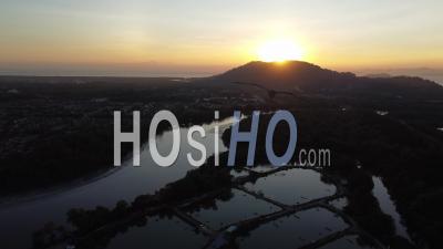 Silhouette Sunset Of Fish Farm - Video Drone Footage