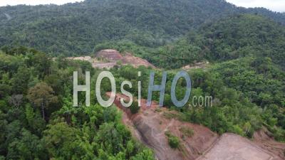 Aerial View Deforestation Near The Hill - Video Drone Footage