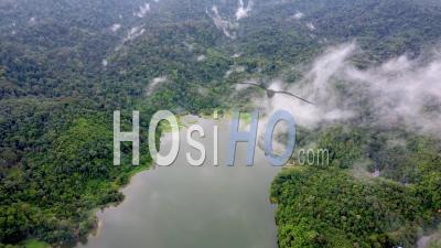 Aerial View Low Cloud Move At Malaysia Lake - Video Drone Footage