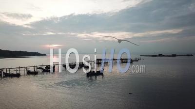 Fishing Boat Leave Jetty In Morning - Video Drone Footage