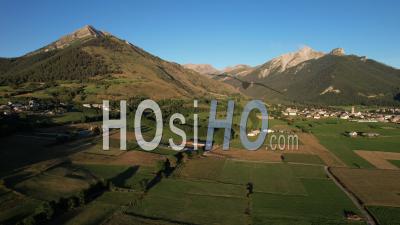 The Plain Of Ancelle At The End Of The Day, In The Champsaur Valley, Hautes-Alpes, France, Viewed From Drone